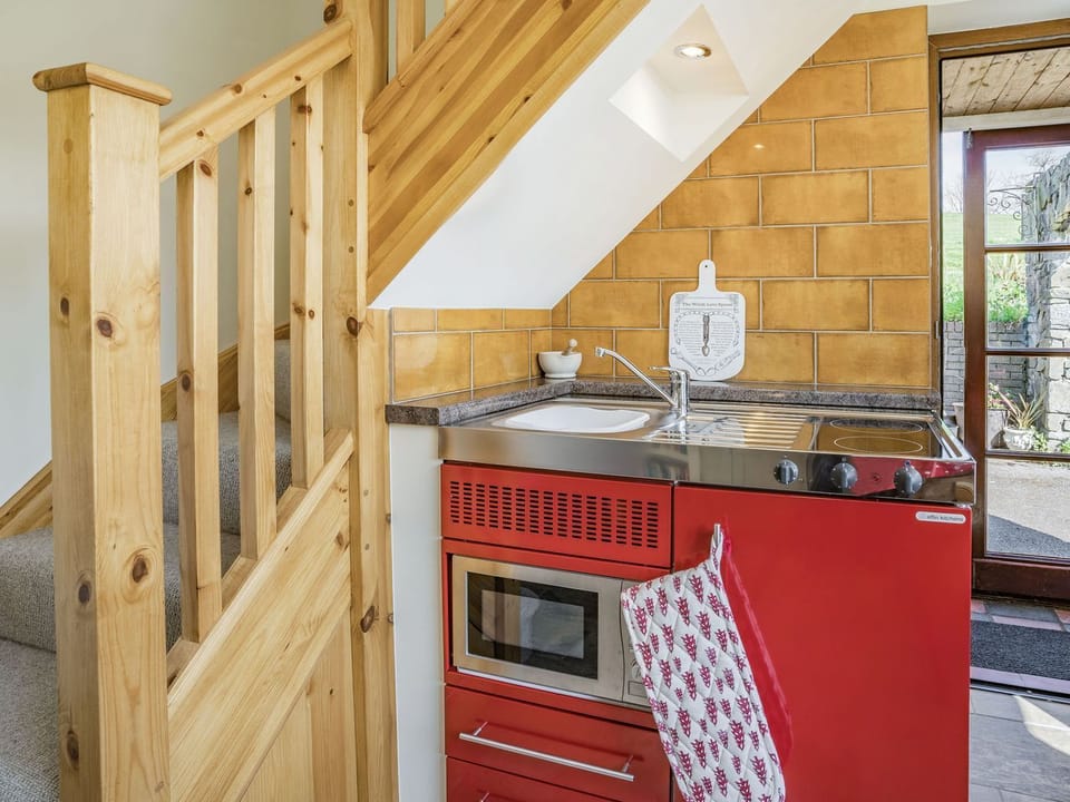 Fridge, microwave, cookware/dishes/utensils