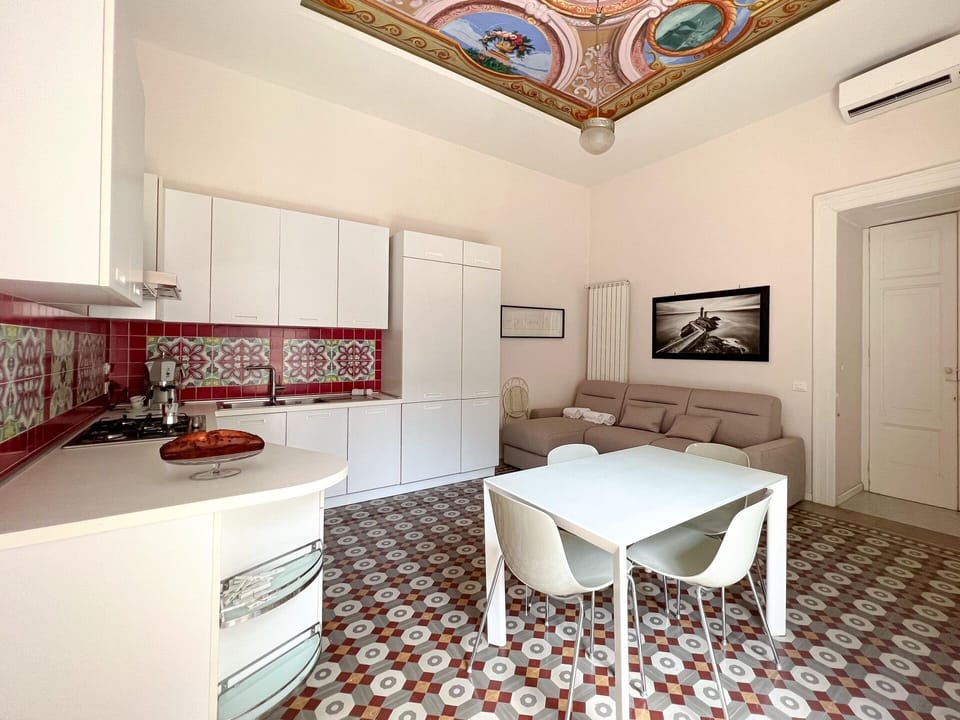 Apartment, 1 Bedroom | Living area | 32-inch flat-screen TV with cable channels