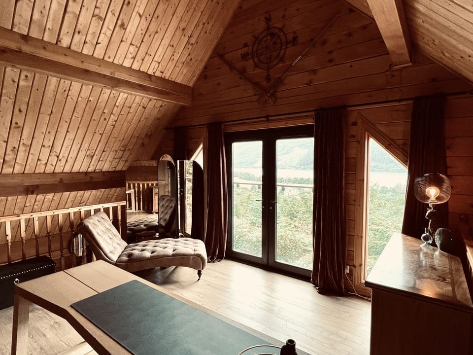 Mezzanine with workspace and views of Loch Ness