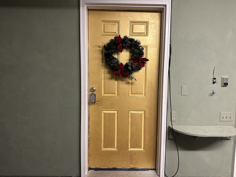 Door Inside Garage to Basement Apartment