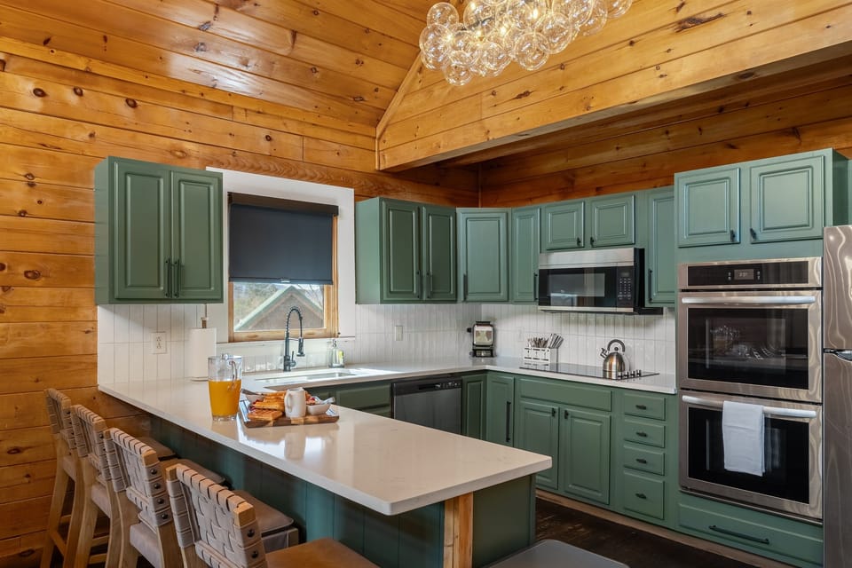 fully stocked, large kitchen with full size stainless appliances