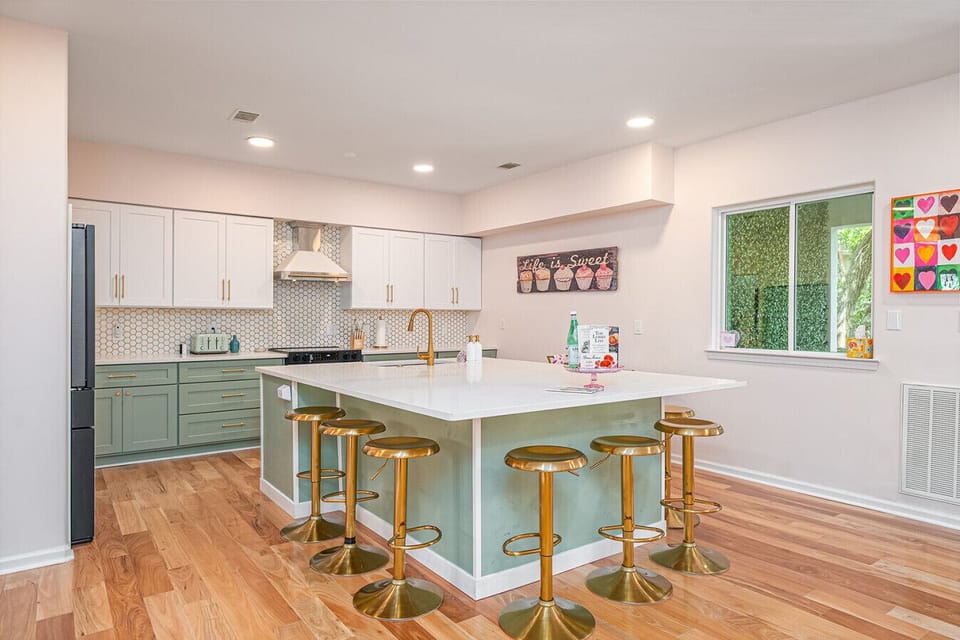 Massive kitchen island with bar stool seating for 10+!