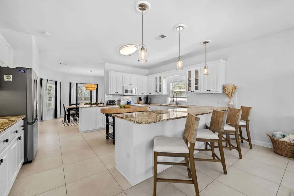 Large kitchen is fully stocked with all your cooking essentials! Perfect for cooking together.