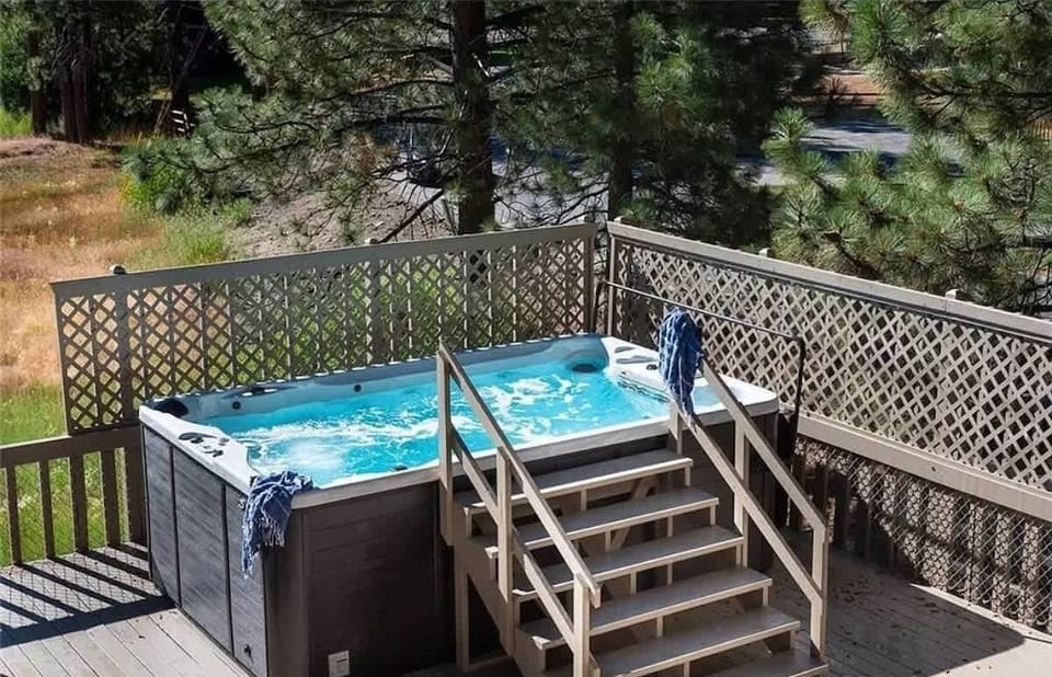 View of spa from the patio. You do not share the space or spa. The spa is for your booking only. 