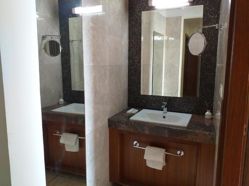 Shower, slippers, bidet, towels