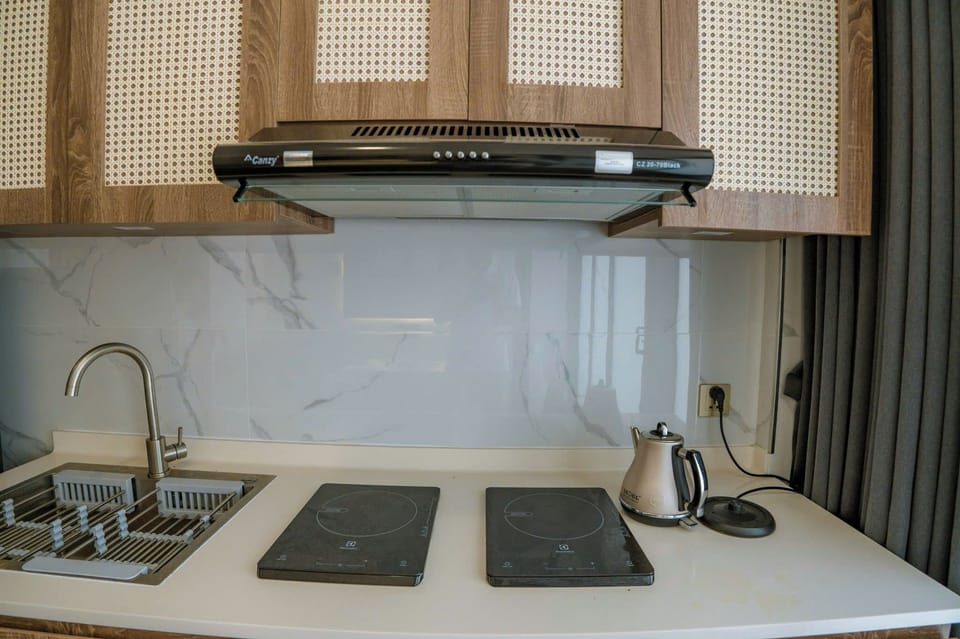 Fridge, microwave, cookware/dishes/utensils