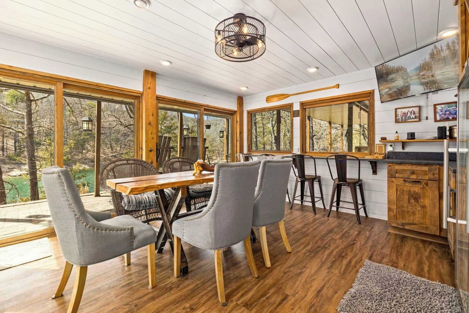 An additional dining area featuring a spacious table for 6, complemented by 4 extra chairs for flexible seating and gatherings.