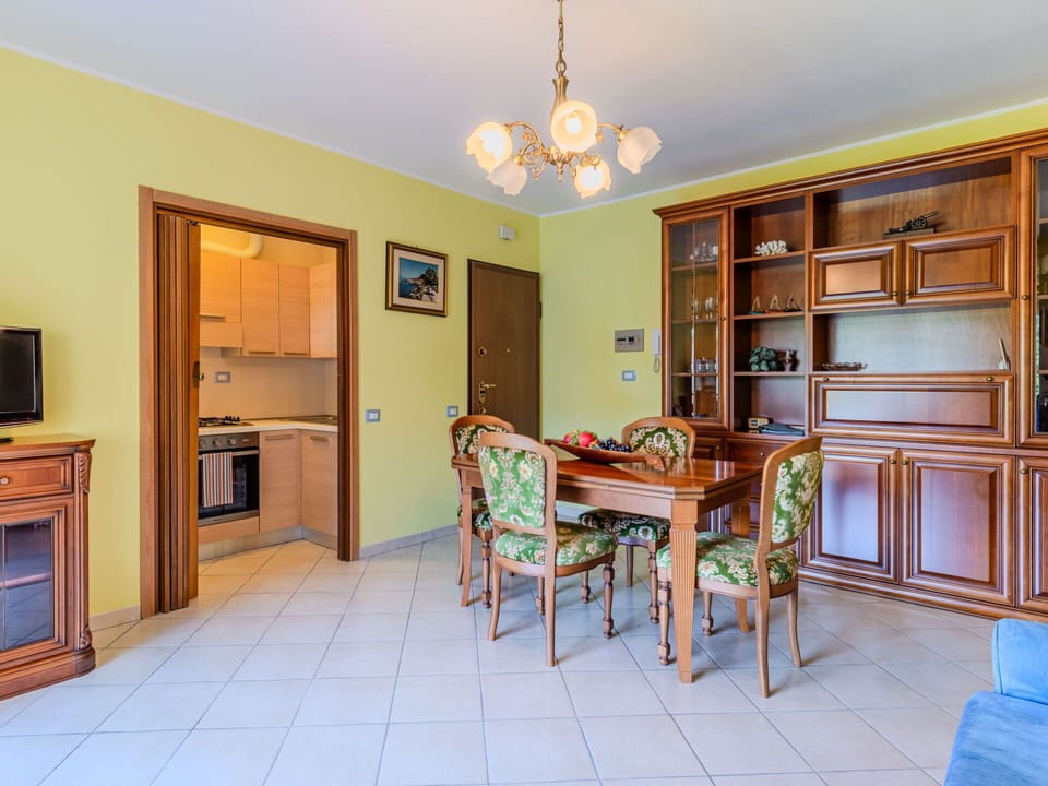 Interior Design, Flooring, Furniture, Wood, Ceiling, Floor, Room, Cabinetry, Lighting, Table