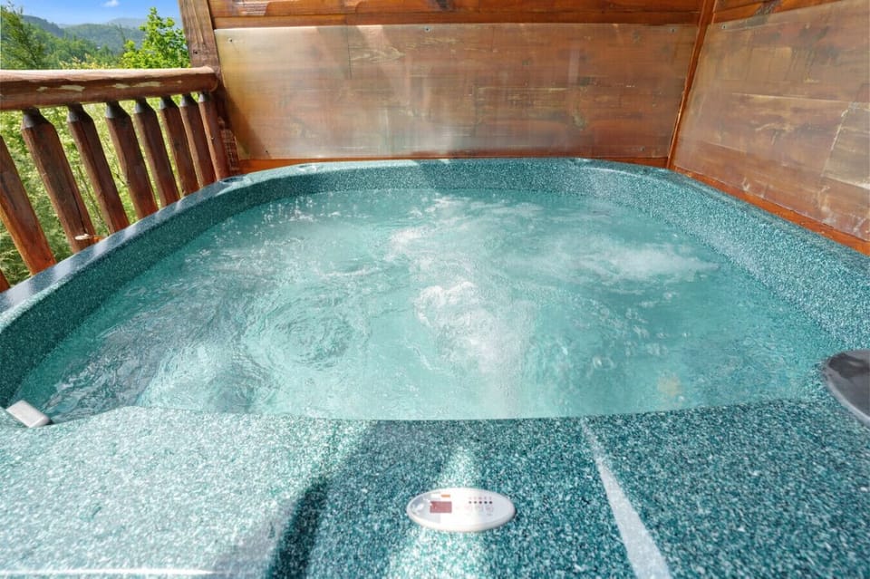 Soak under the stars or greet the morning with mountain air in this spacious, jetted hot tub just steps from the back door.