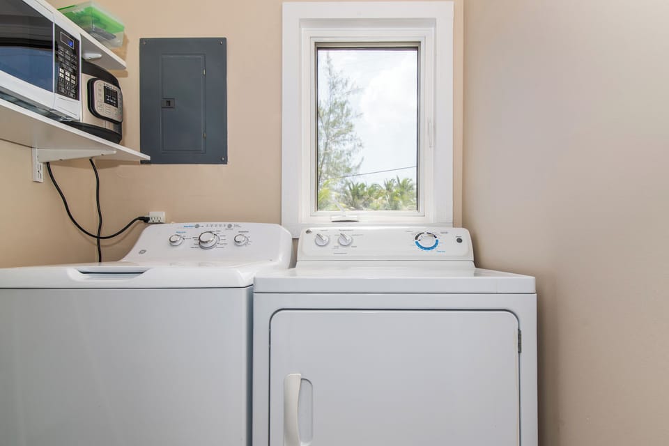 Laundry room just off the kitchen area. 