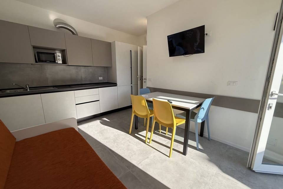Apartment, 1 Bedroom, Patio, Garden View | Dining room