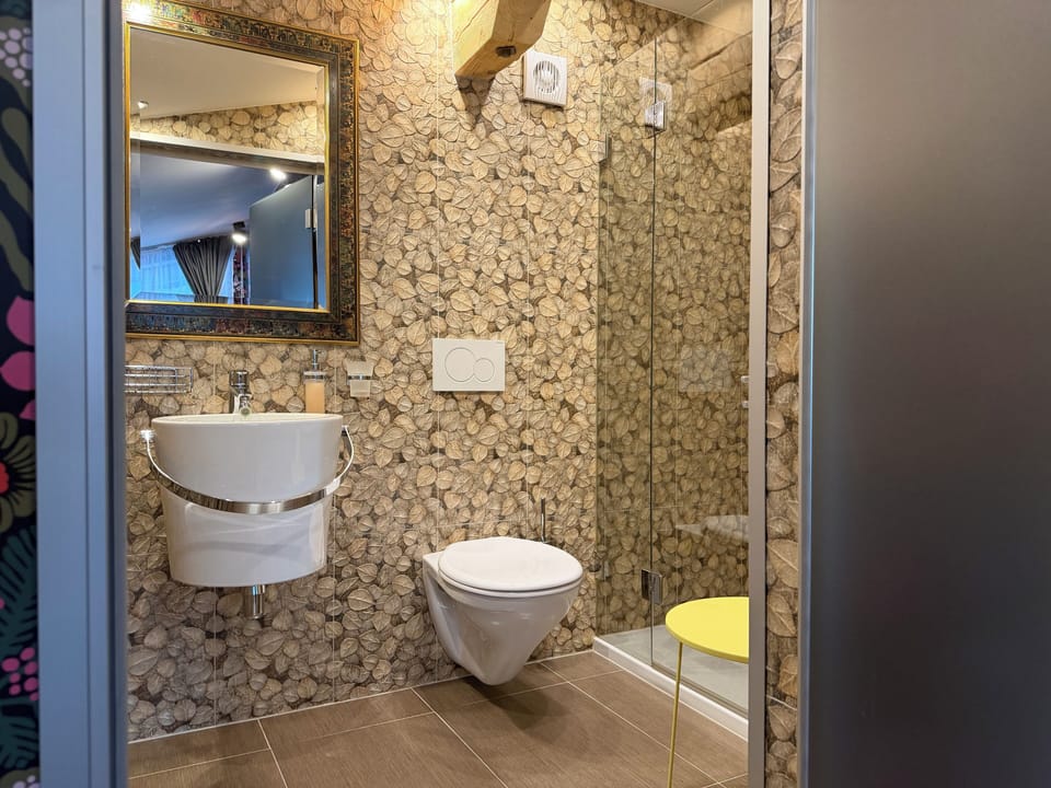 Classic Studio Suite, Balcony, Mountain View | Bathroom | Hair dryer, slippers, towels, soap