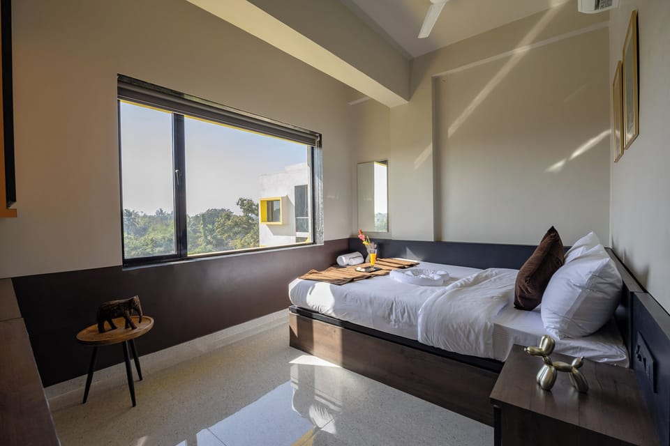 Deluxe Double Room, Pool View | Laptop workspace, soundproofing, free WiFi
