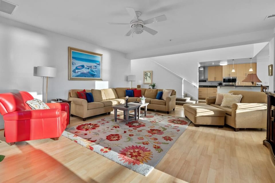 Gather and relax in this warm living area by the stairs the perfect spot to unwind before heading up to rest.