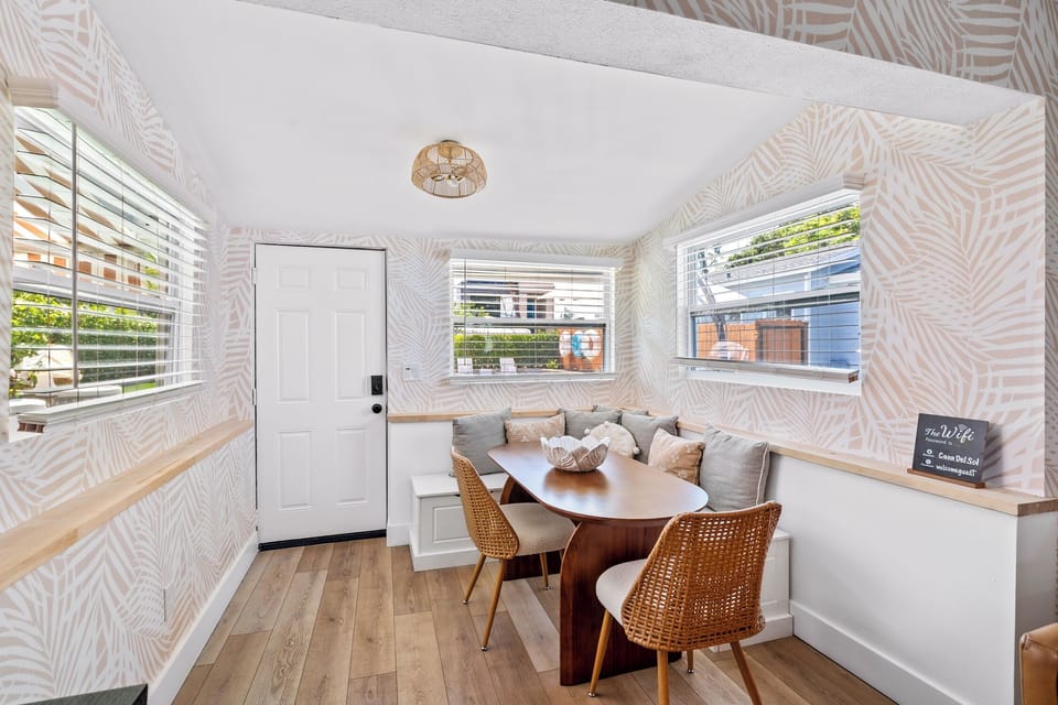 Bask in natural light as you gather around Casa Sol’s charming dining table—where every meal feels like a special occasion.