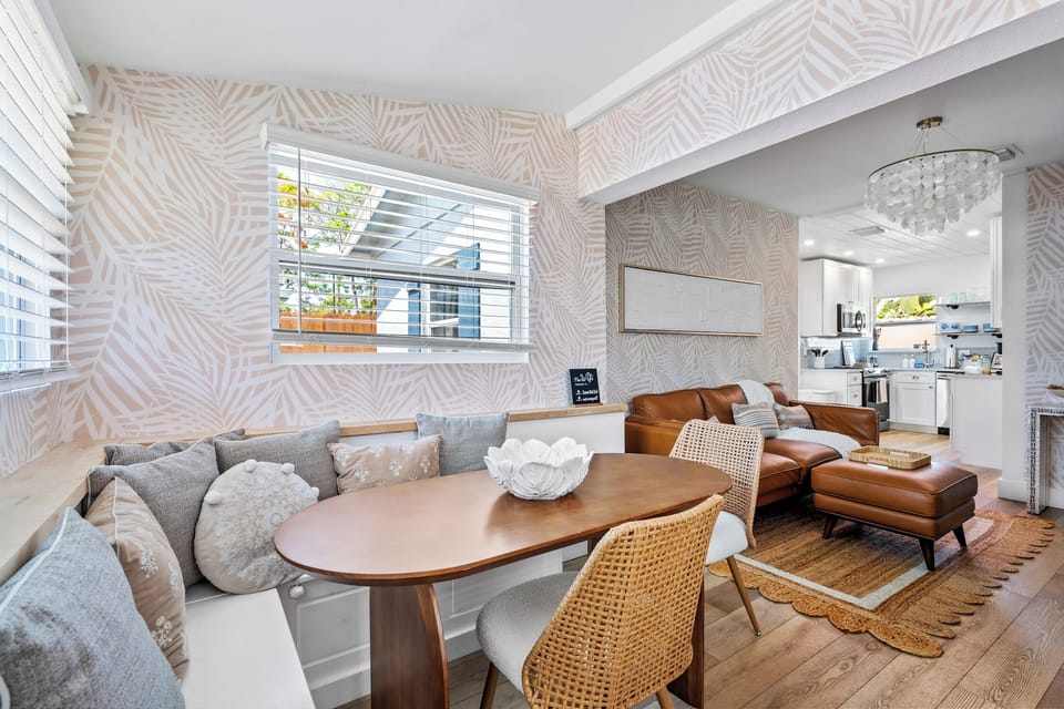 Casa Sol’s quaint dining nook offers the perfect setting for morning coffees, intimate dinners, or heartfelt conversations in a cozy atmosphere.
