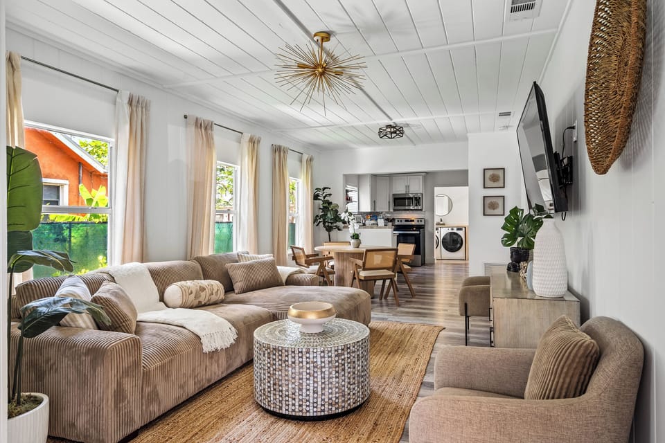 Unwind in Casa Luna's inviting living room, featuring a brand-new, plush couch and a 55-inch flat-screen TV—perfect for cozy evenings or catching up on your favorite shows.
