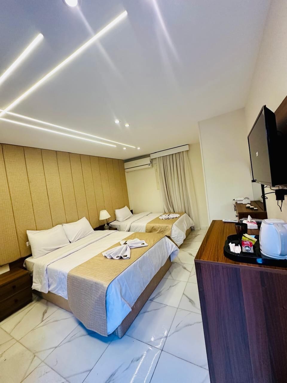 Free minibar items, in-room safe, laptop workspace, blackout drapes