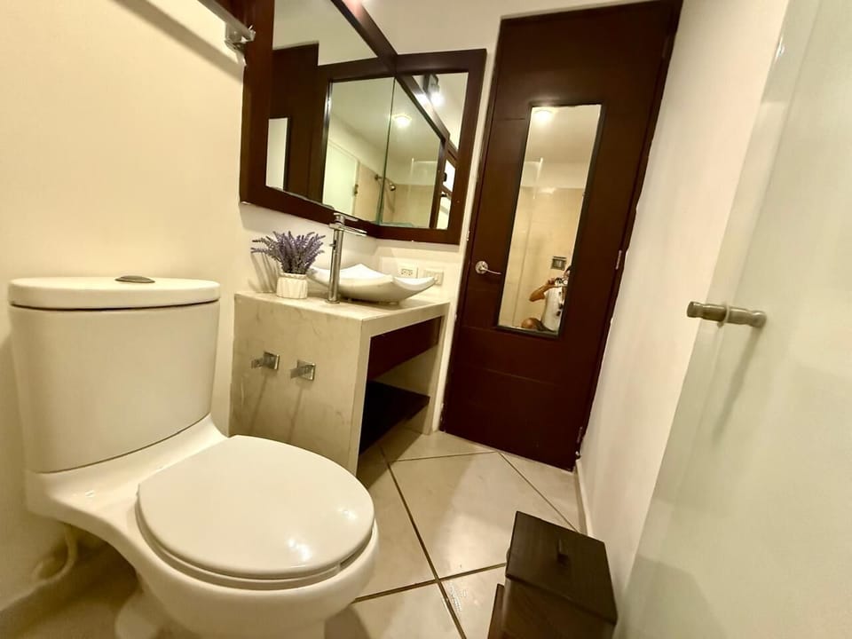Deluxe Suite, 2 Queen Beds, Balcony, City View | Bathroom | Shower, towels, soap, shampoo
