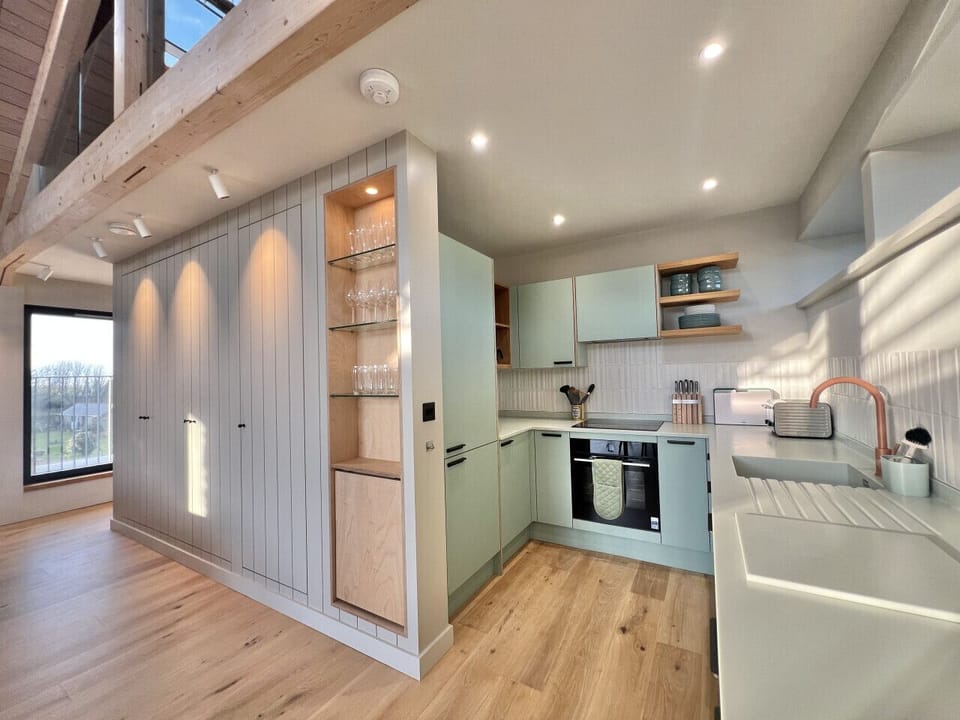 Architecturally designed interior with fully equipped kitchen