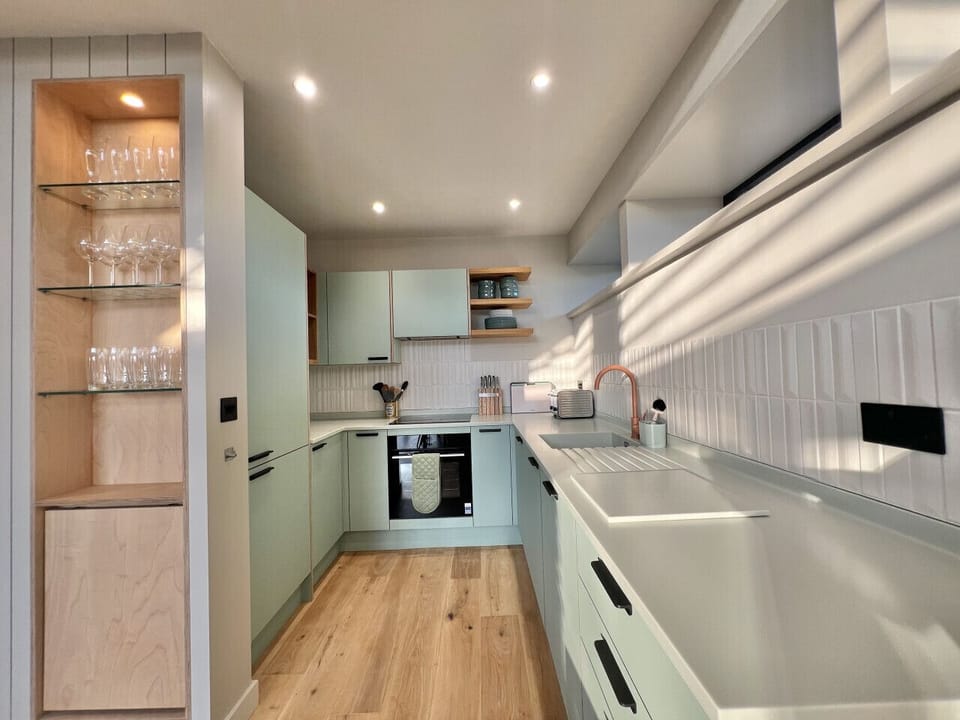 Architecturally designed interior with fully equipped kitchen