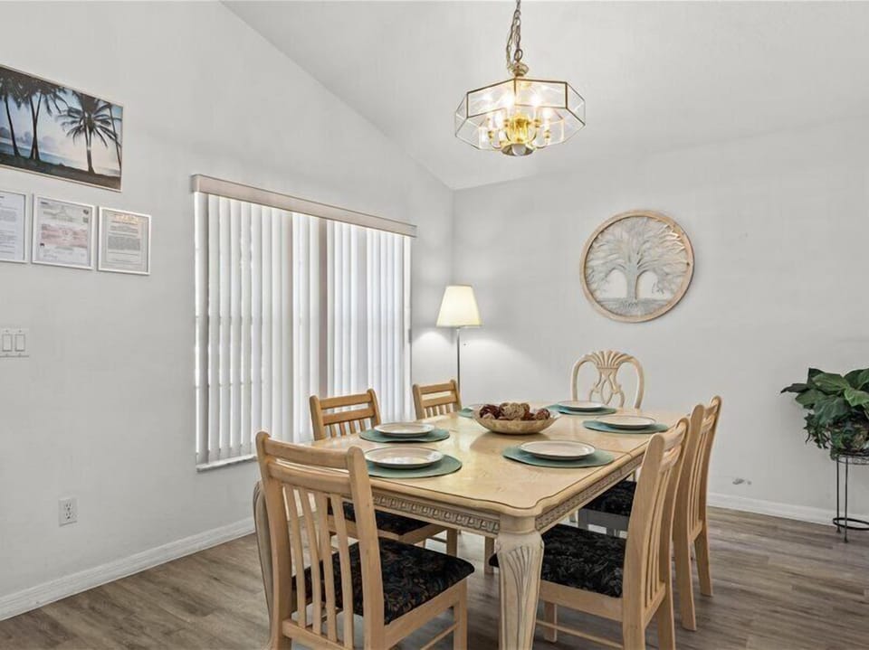 This inviting space is perfect for family meals or entertaining guests while enjoying the beauty of the outdoor setting.