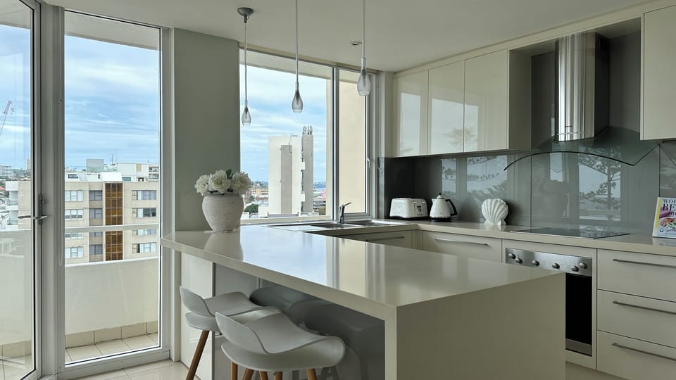 Even the kitchen has wonderful views of the ocean and Manly