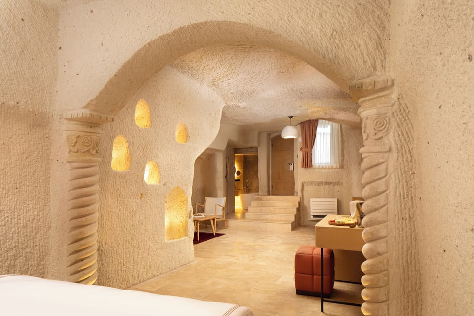 Premium Cave Suite | Egyptian cotton sheets, premium bedding, minibar, in-room safe
