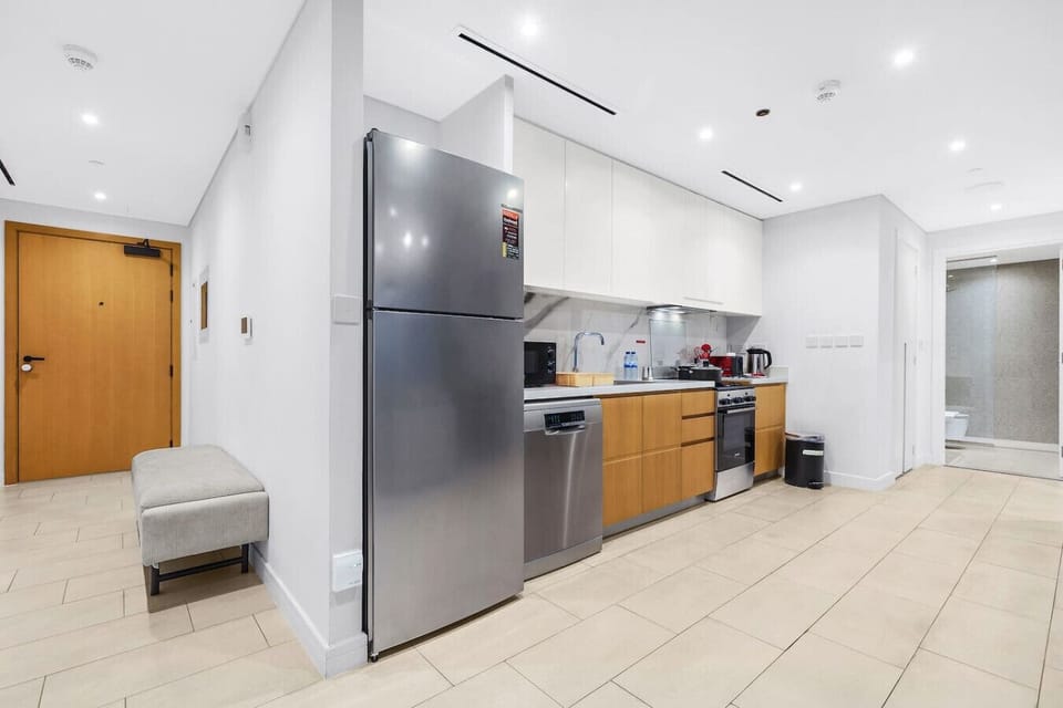 Stylish Kitchen: Modern appliances and sleek design invite culinary adventures in Dubai!