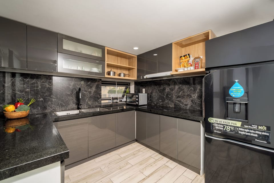 Family Penthouse, 2 Bedrooms, City View | Private kitchen | Fridge, dining table