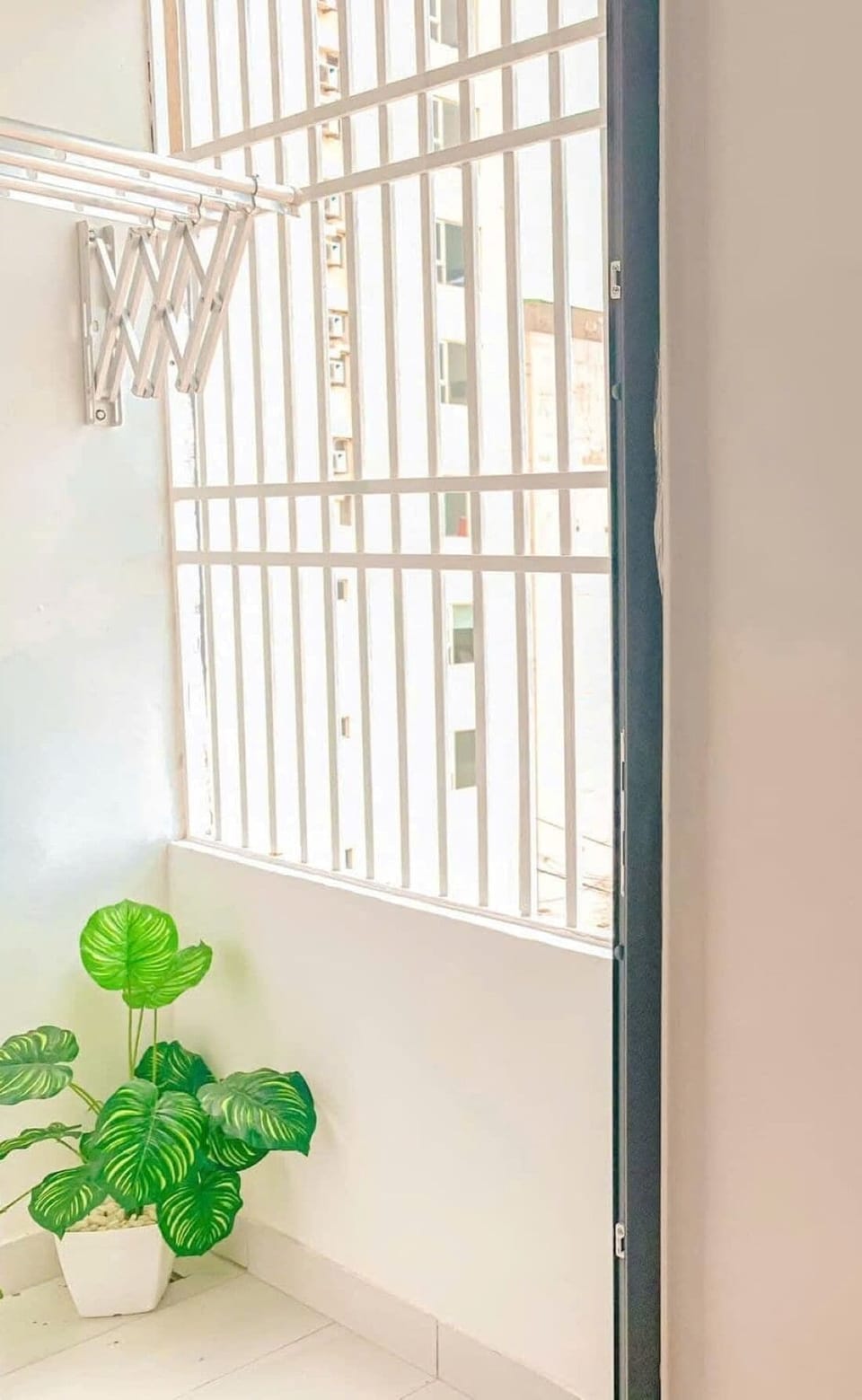 Family Apartment, 1 Bedroom, City View | Minibar, desk, blackout drapes, iron/ironing board