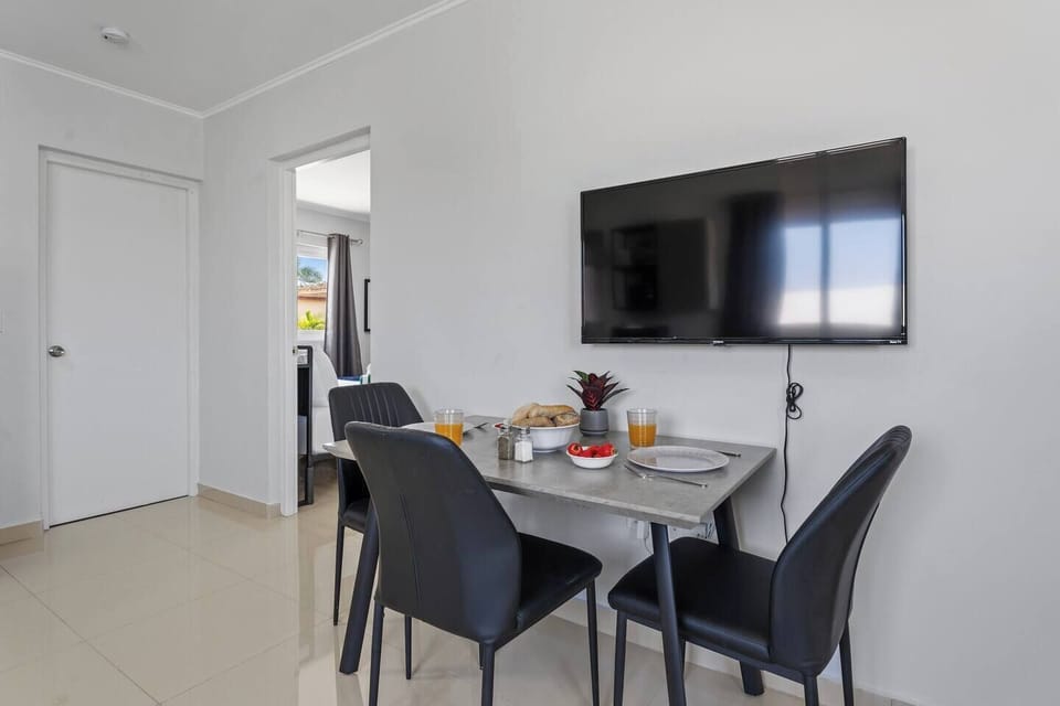 Elegant dining area with a modern setup.


