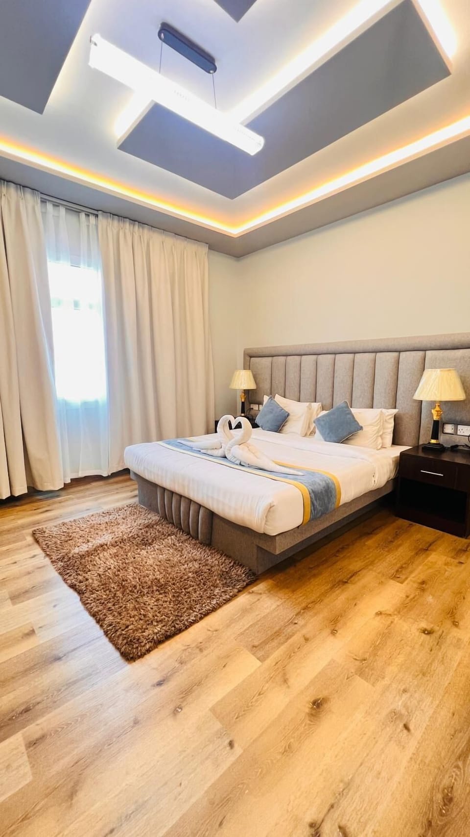 Deluxe Apartment, 2 Bedrooms | 2 bedrooms, in-room safe, blackout drapes, iron/ironing board