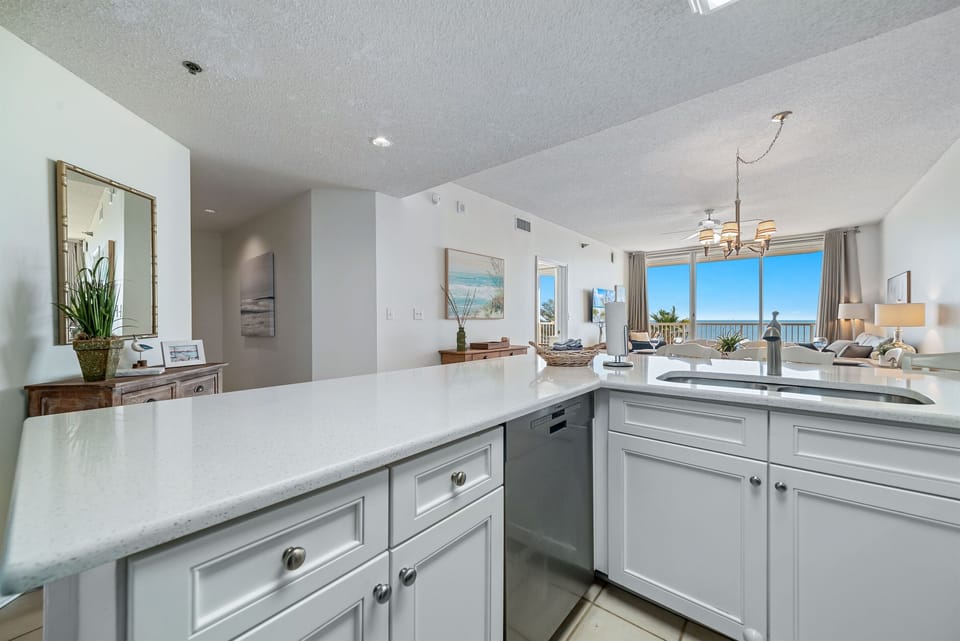 Bright and airy kitchen with ample counter space and modern amenities, creating an inviting space for cooking and gathering.