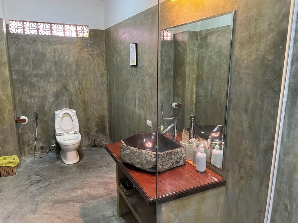 Deluxe Villa, Kitchen, Garden View | Bathroom | Shower, hair dryer, towels, soap