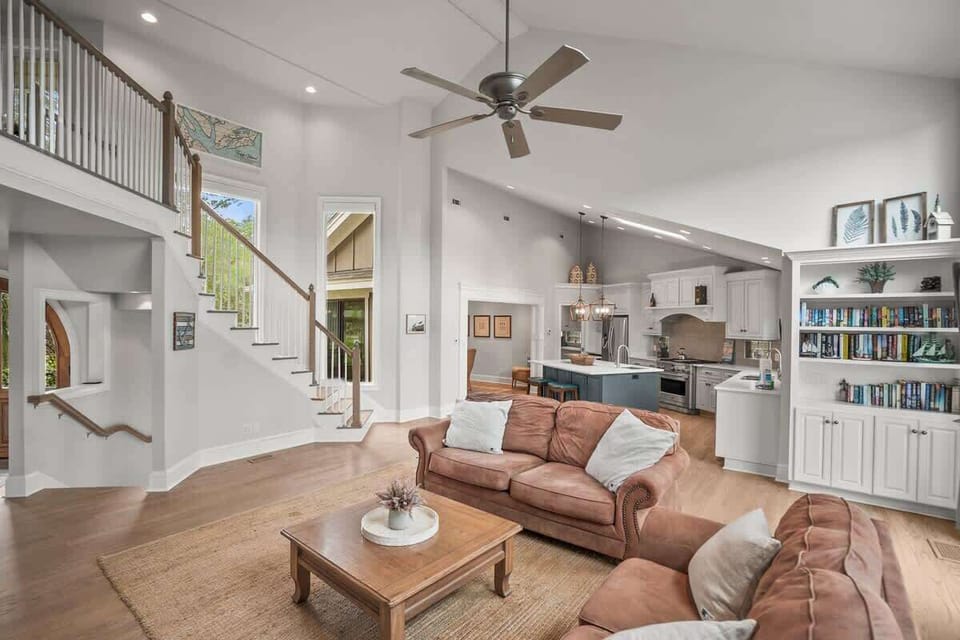 Open Concept Living Room with Access to Decks and Screened Porch with Marsh and Ocean Views