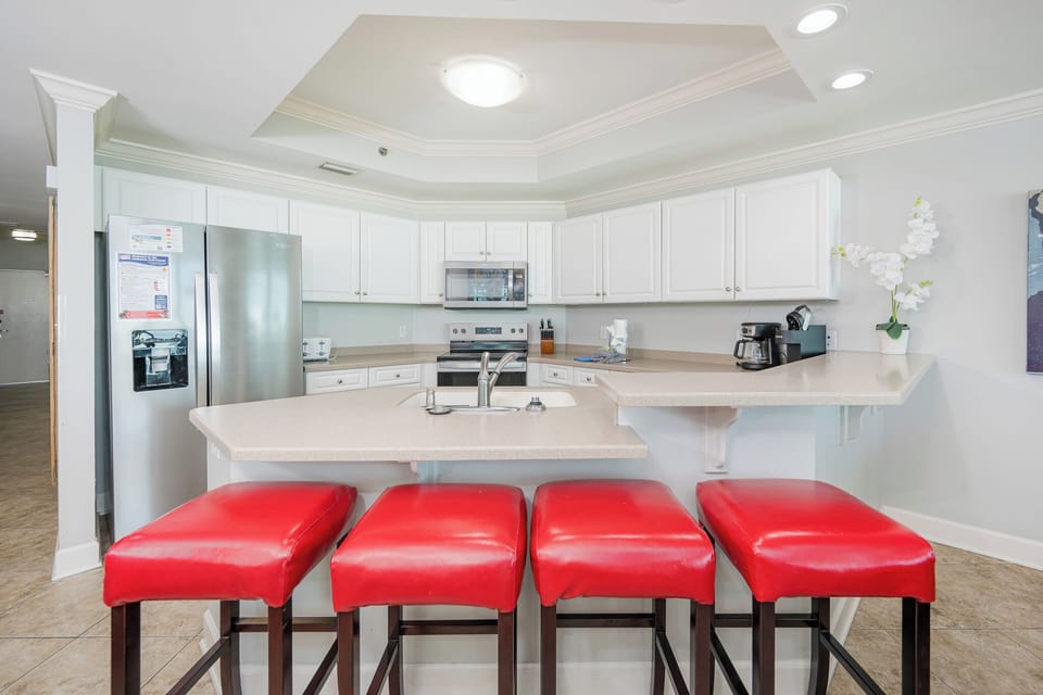 Pull up a stool at the breakfast bar to share stories while the coffee maker fills the air with rich aroma