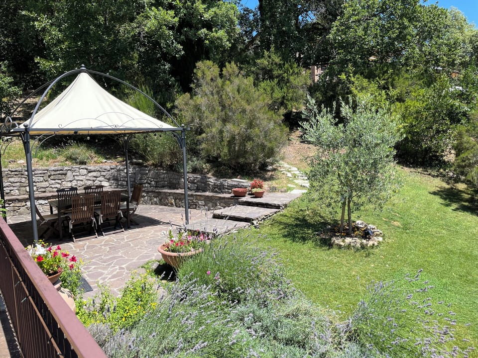 Al fresco dining under the gazebo, in lavender scented gardens with lake view