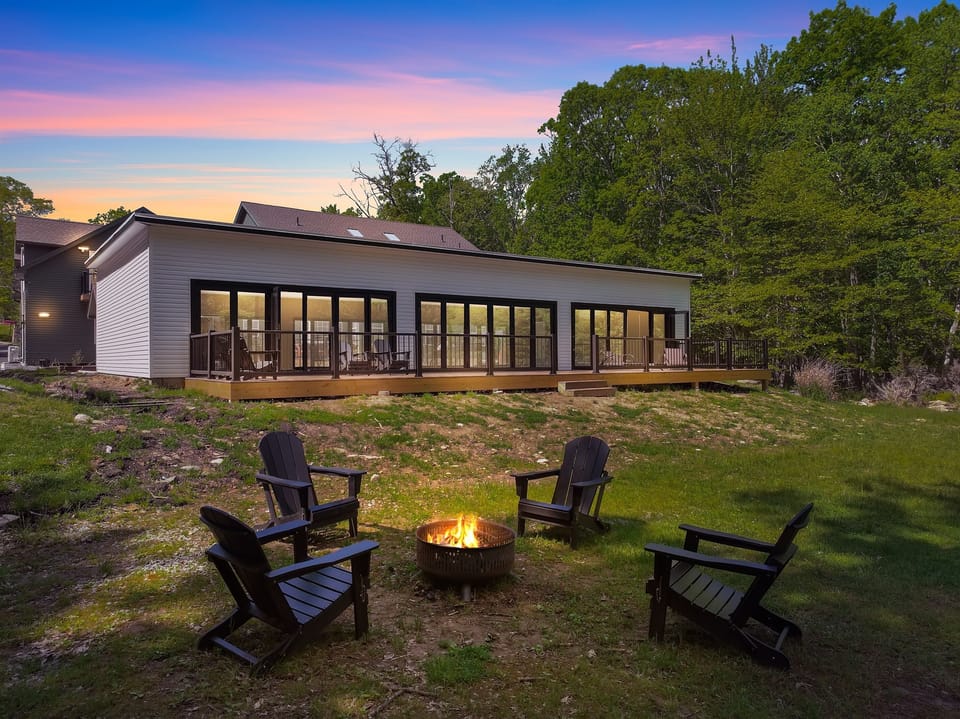 Step into our outdoor haven, where quality time meets the peaceful embrace of nature. Spend summer evenings gathered around the firepit, sharing stories and laughter.