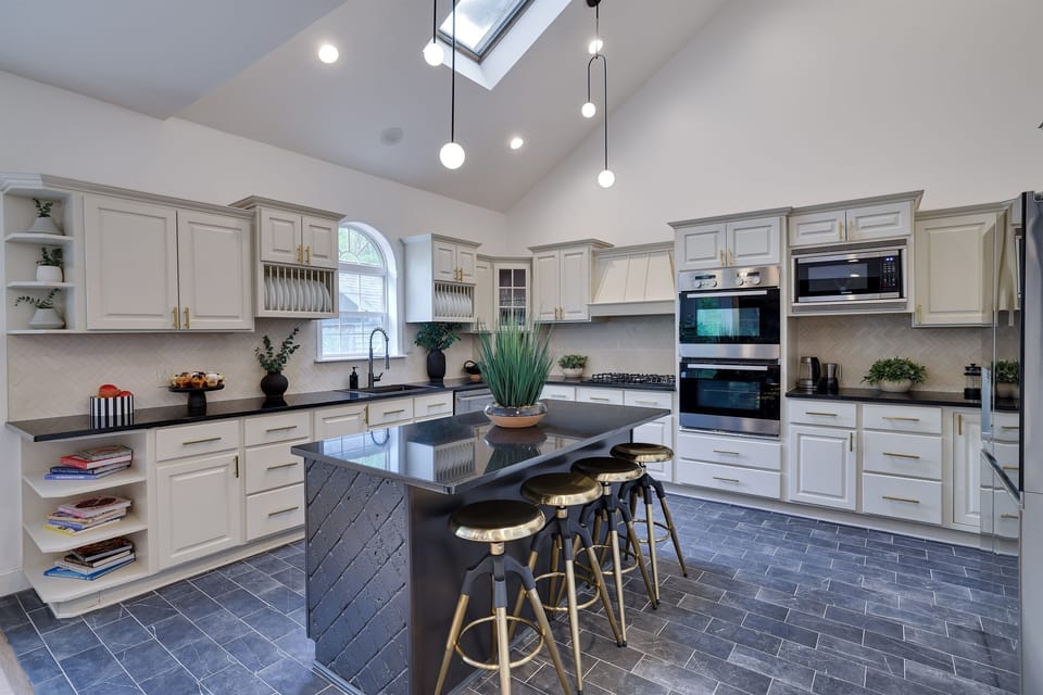 Fully stocked kitchen with dual ovens