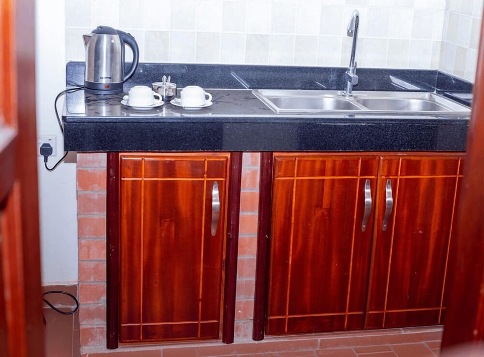Double Room Single Use, Balcony, Valley View | Private kitchen | Cleaning supplies