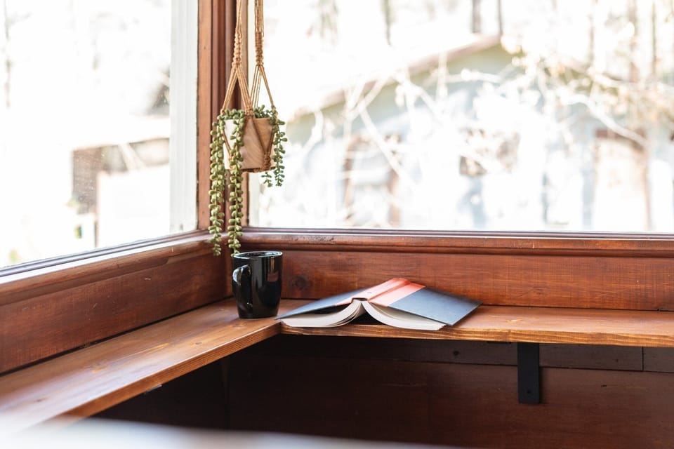 Taking in a book or view. Either way, this spot is magically!
