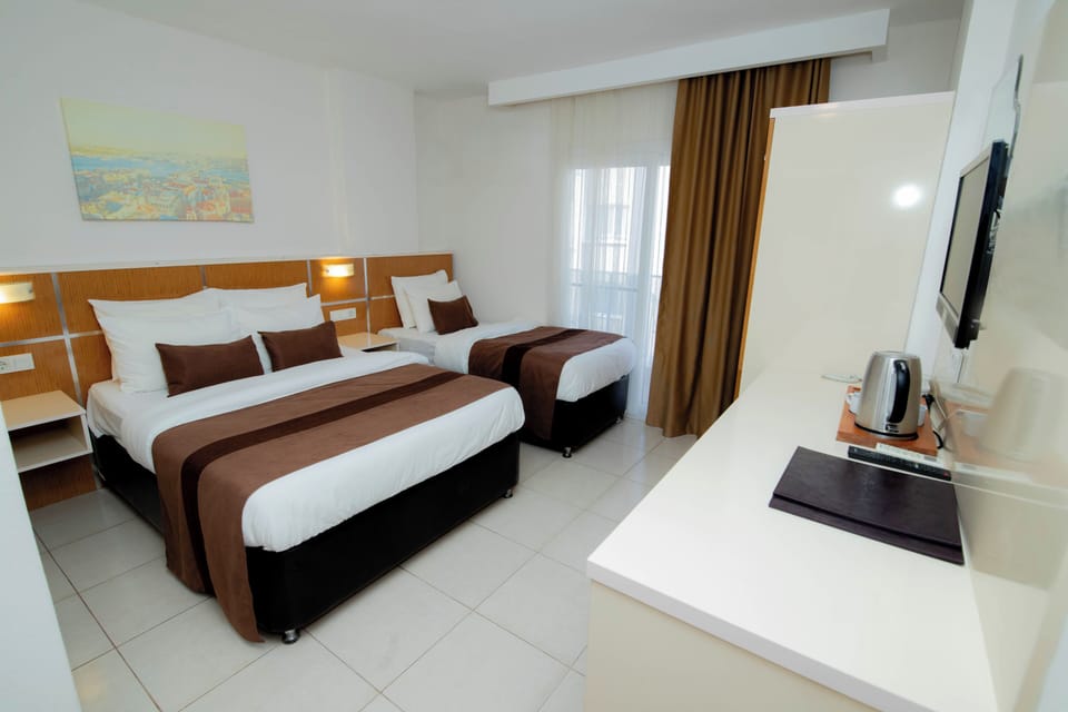 Deluxe Double or Twin Room, City View | In-room safe, blackout drapes, free WiFi