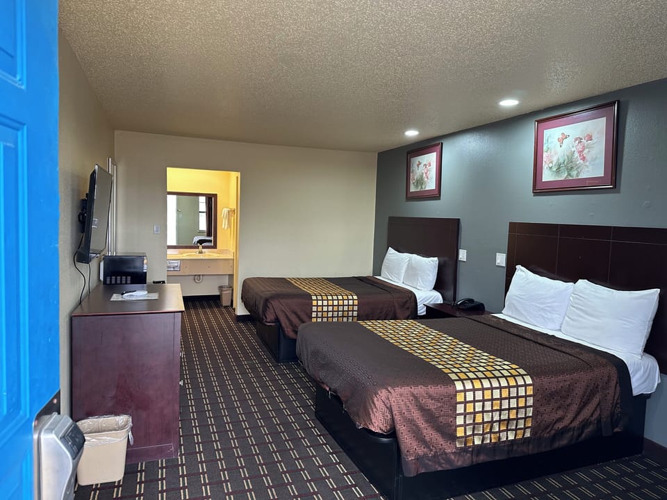 Blackout drapes, iron/ironing board, free WiFi, bed sheets