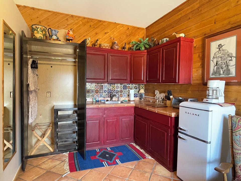 Closet, and luggage rack. Soft closing doors.