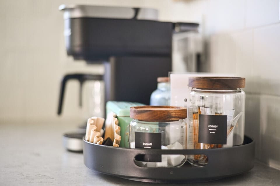 Coffee station includes Keurig carafe / K-pod duo, pods, filters, ground coffee, half & half, honey sticks and sugar cubes.  Also pour over, french press, coffee grinder and foam wand/pitcher.  Tea selection and electric kettle.