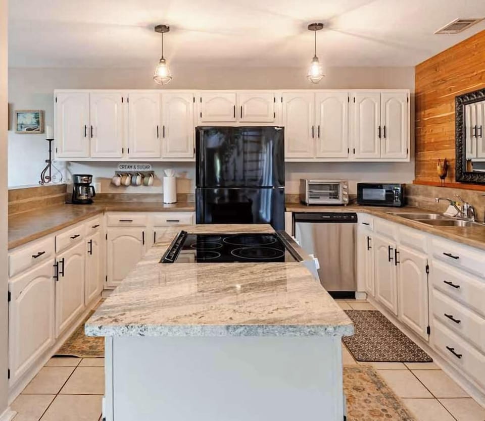 Fully stocked kitchen with everything you need to cook, serve, and enjoy meals together