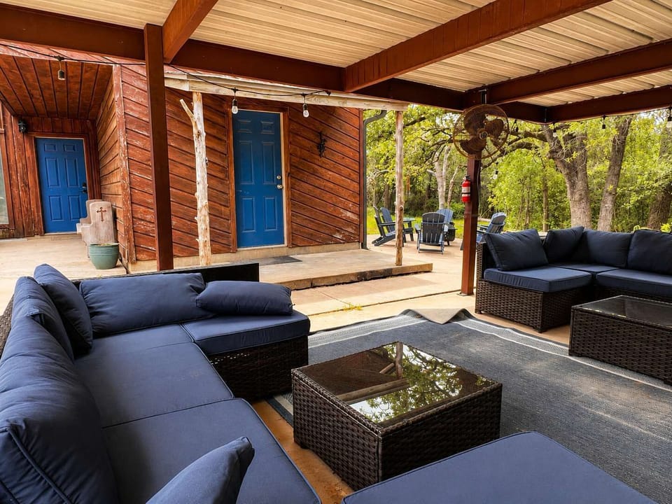 This outdoor seating area has something for everyone. Regardless of the weather, you will be able to hang out outside.