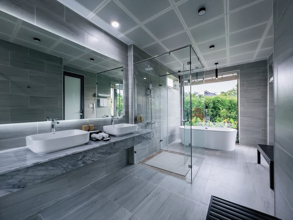 Separate tub and shower, hair dryer, bathrobes, slippers