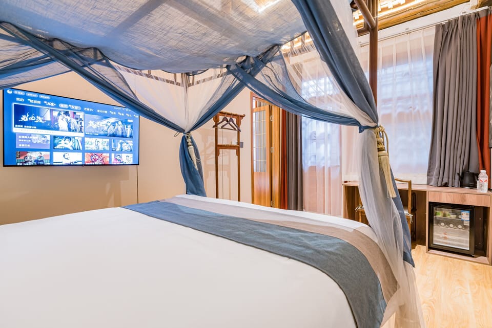 Family Suite, 2 Bedrooms, Courtyard View | Down comforters, memory foam beds, WiFi (free), bed sheets
